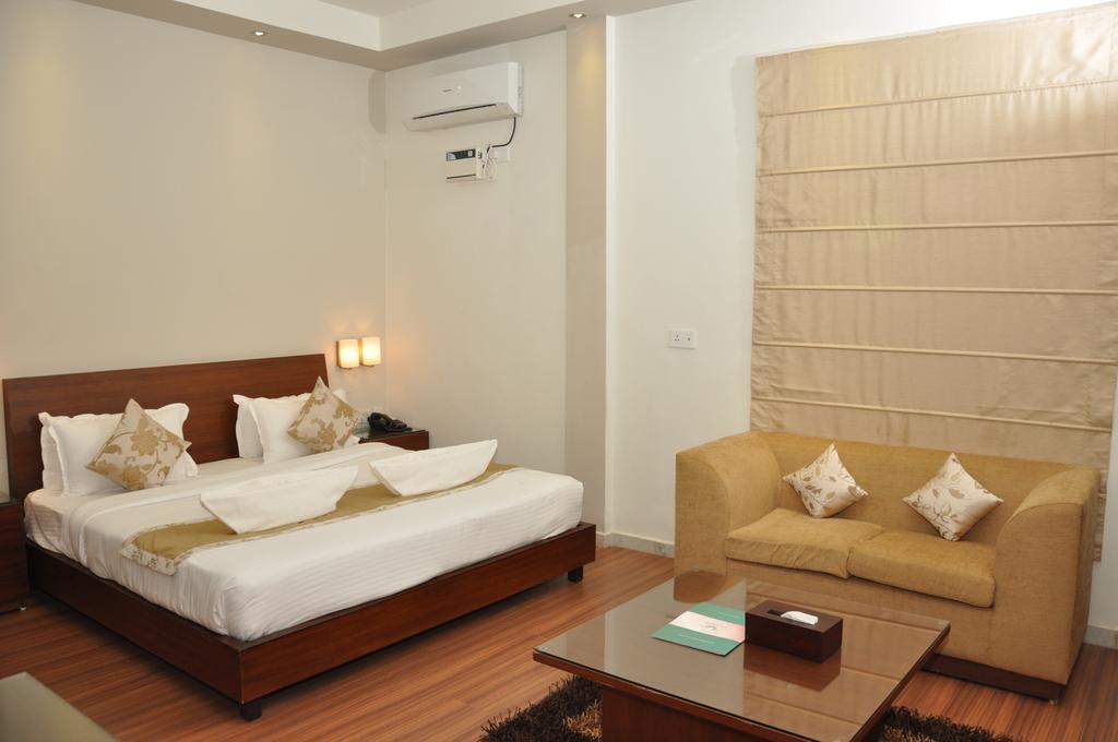 Sukhmantra Resort & Spa Candolim Værelse billede